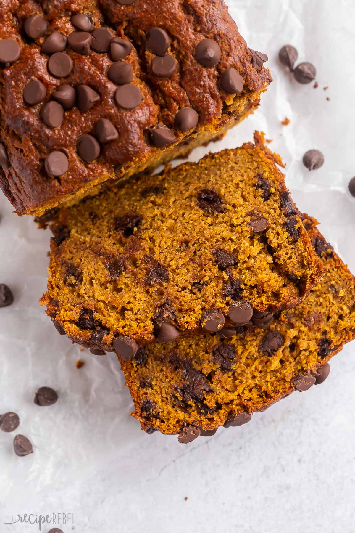 overhead close up image of slice of pumpkin chocolate chip bread.
