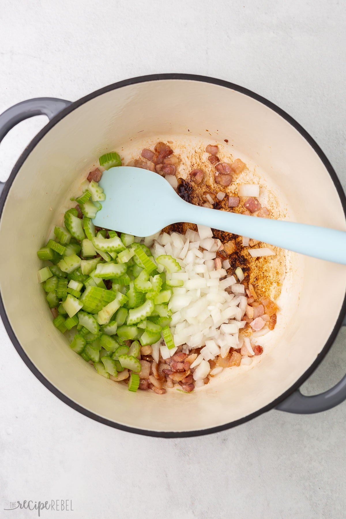 onion and celery added to bacon in large pot.