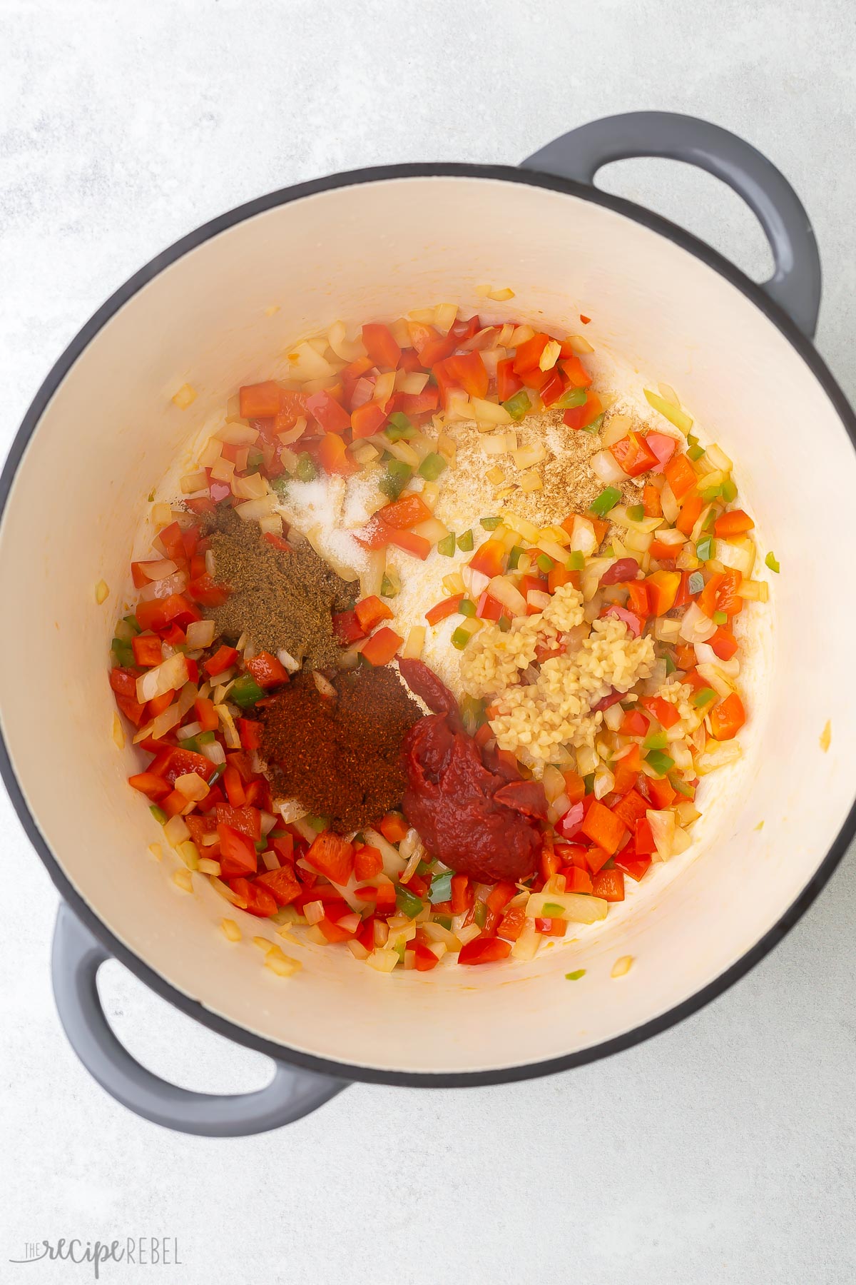 spices added to sauteed vegetables in soup pot.