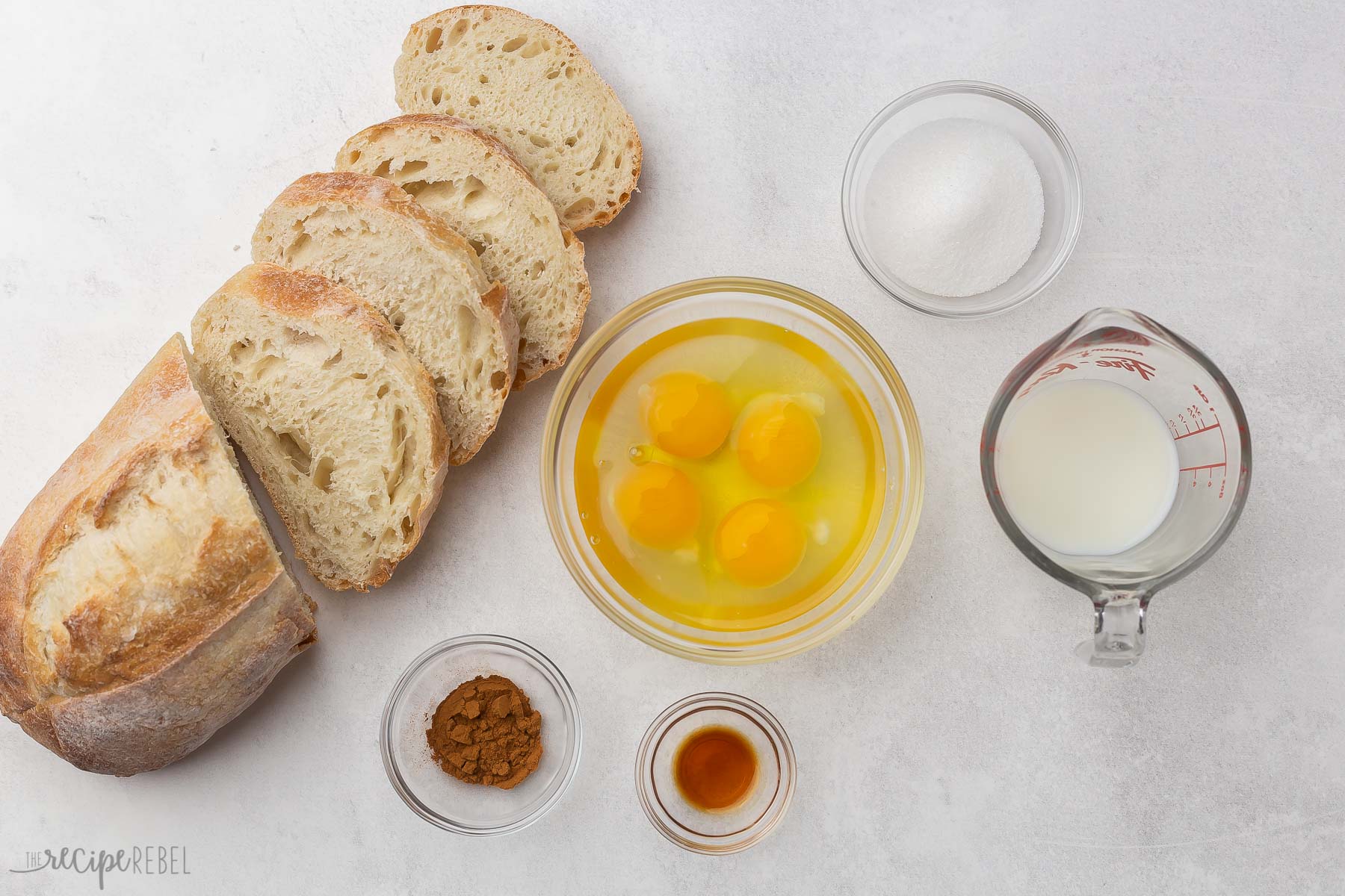 ingredients for air fryer french toast in glass bowls.