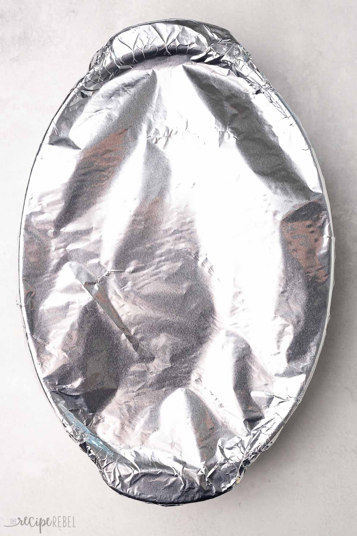 top view of a dish covered in aluminum foil.