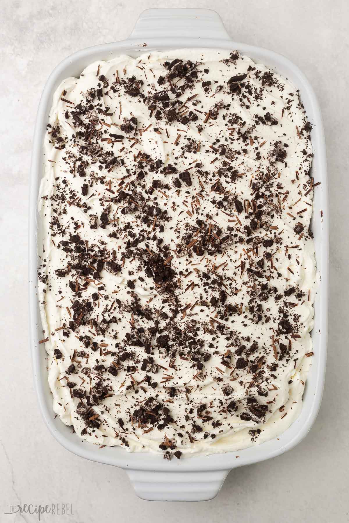 overhead shot of completed chocolate lasagna in a white pan.
