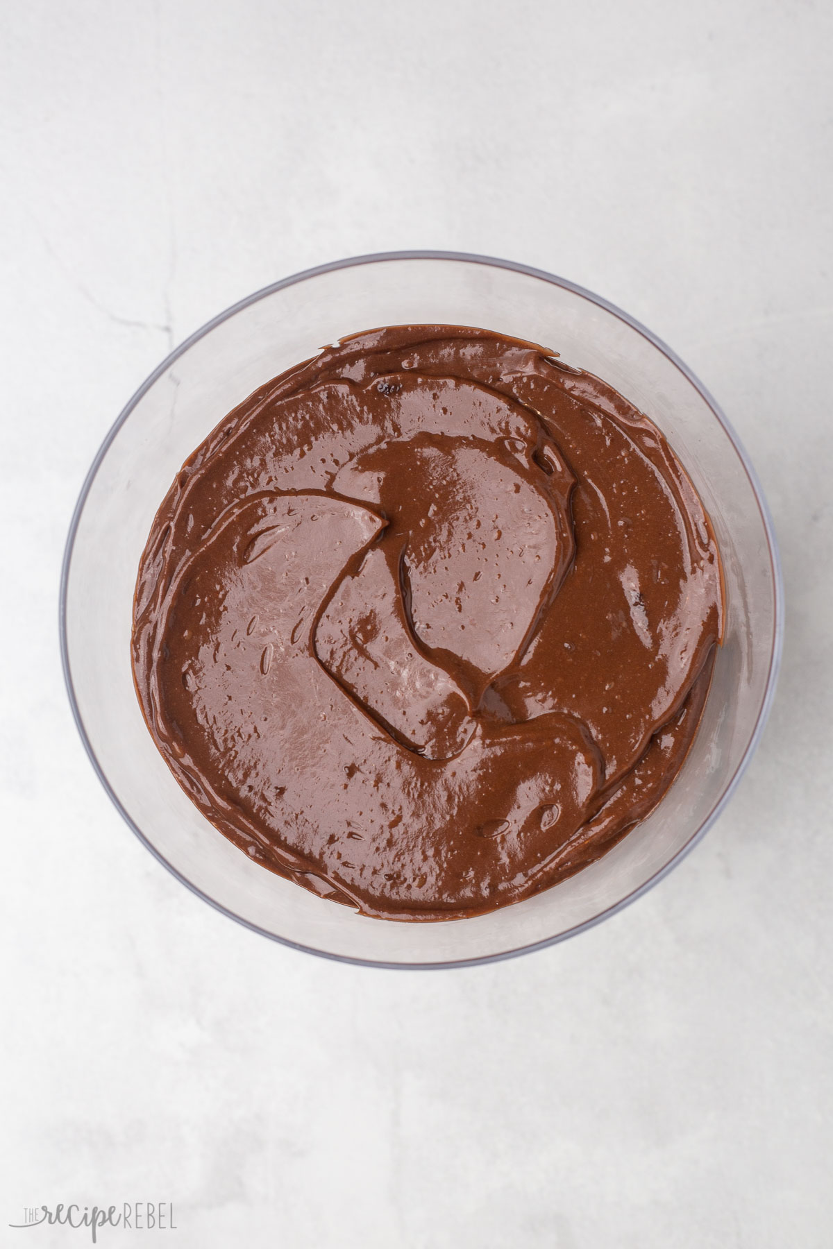 chocolate pudding spread in glass dessert bowl.