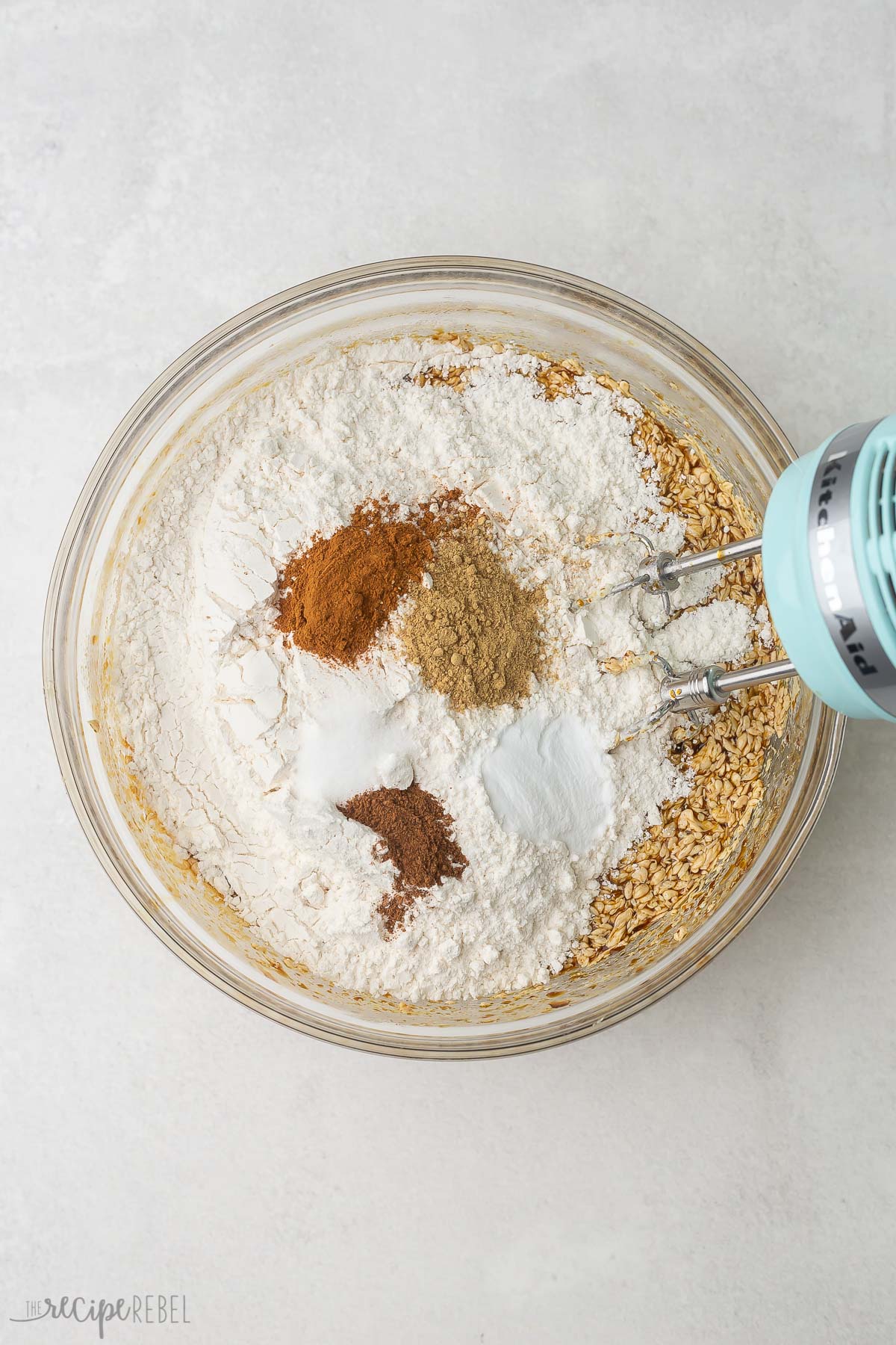 dry ingredients in a glass mixing bowl with electric mixer.