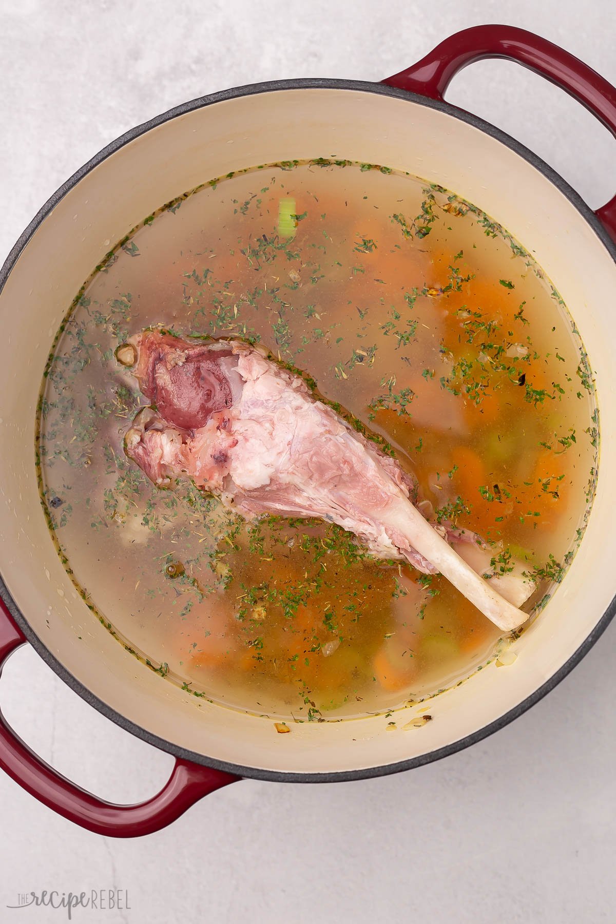 ham bone and broth in dutch oven.