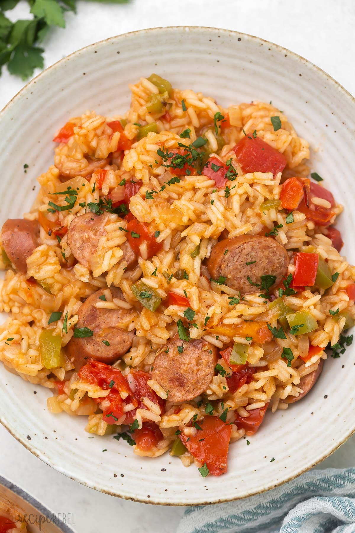 Close up top view of a full bowl of one pot sausage and rice.