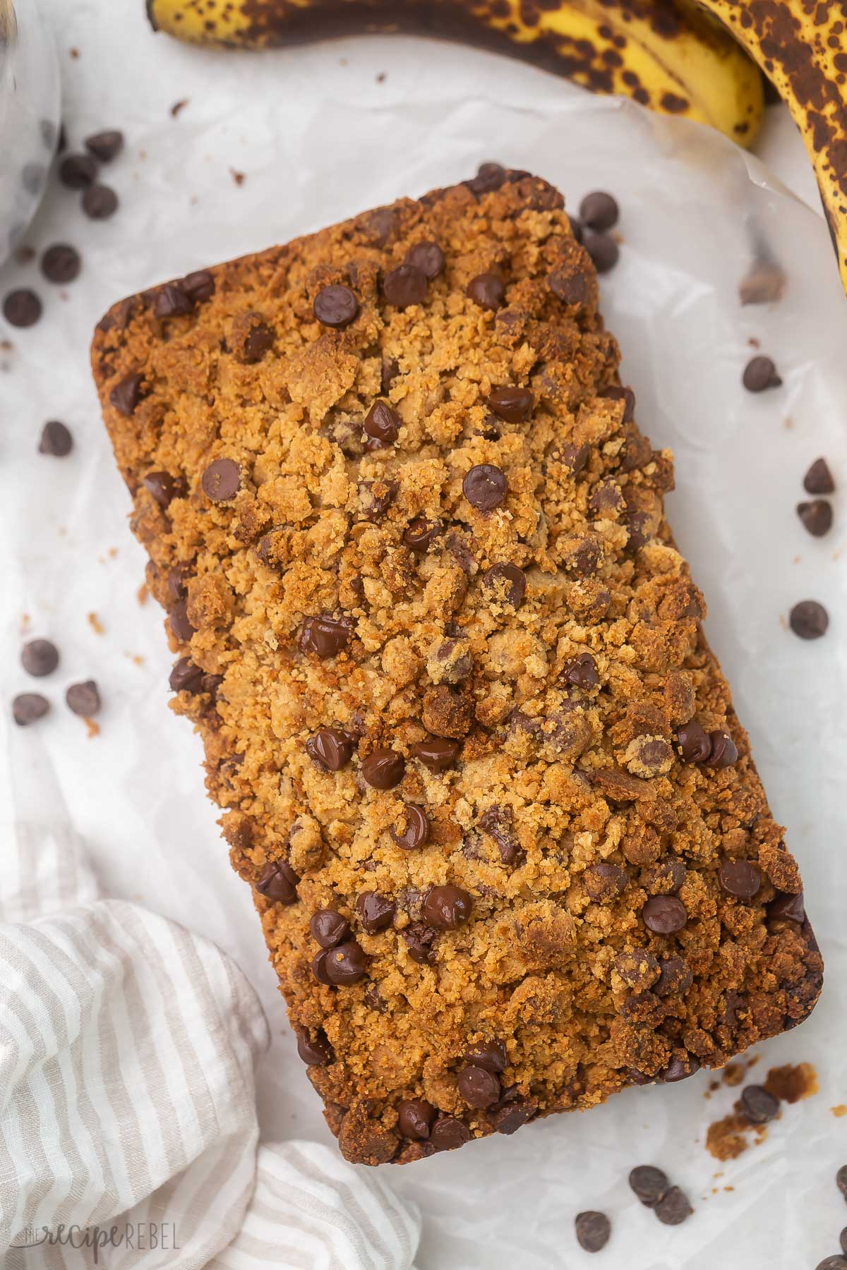 overhead view of a full loaf of peanut butter chocolate chip streusel banana bread.