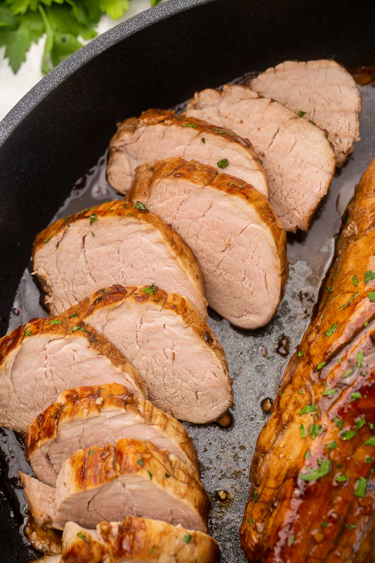 close up of cooked pork tenderloin freshly sliced.