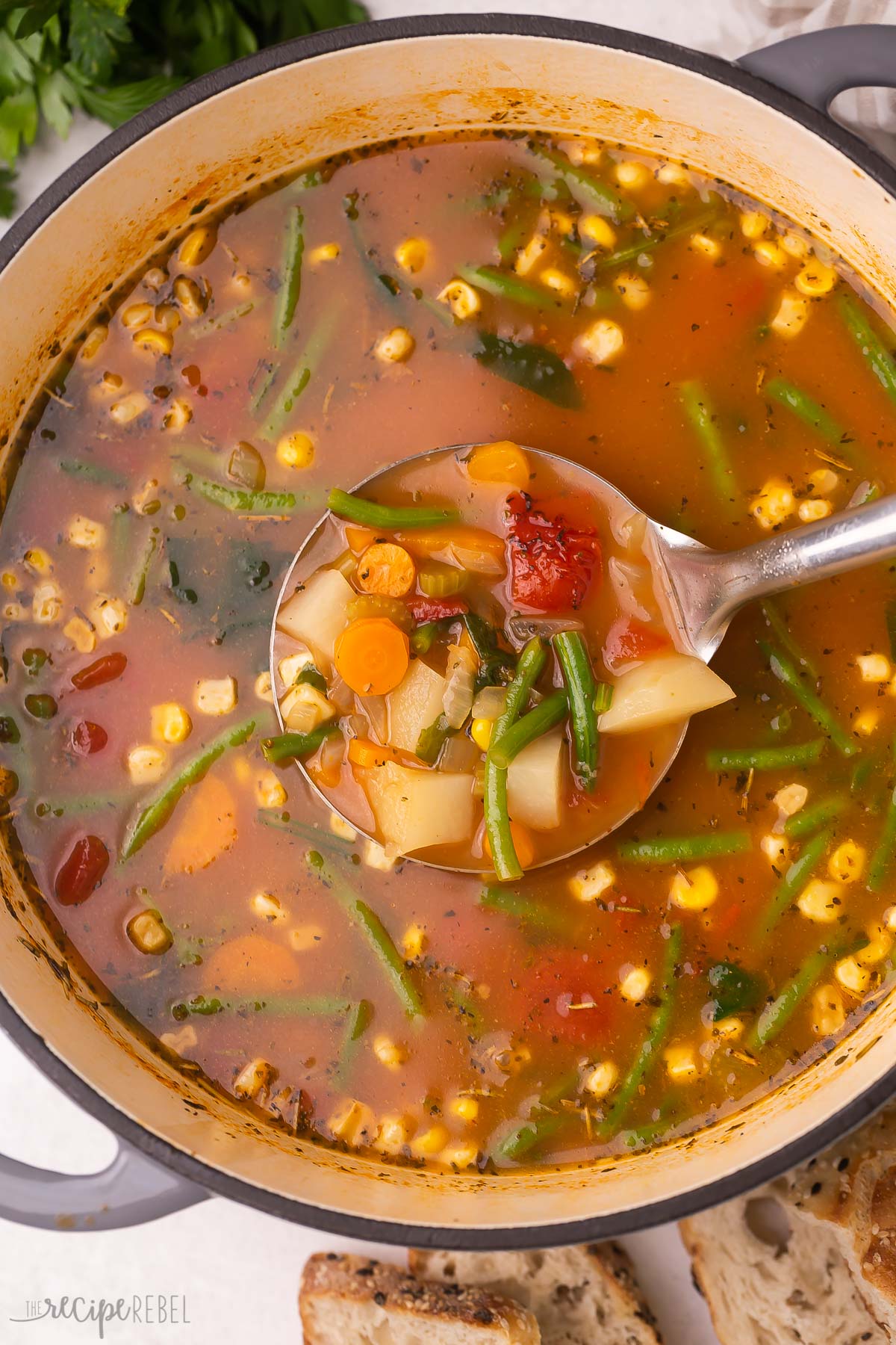 Top view close up of vegetable soup in a dutch oven. 