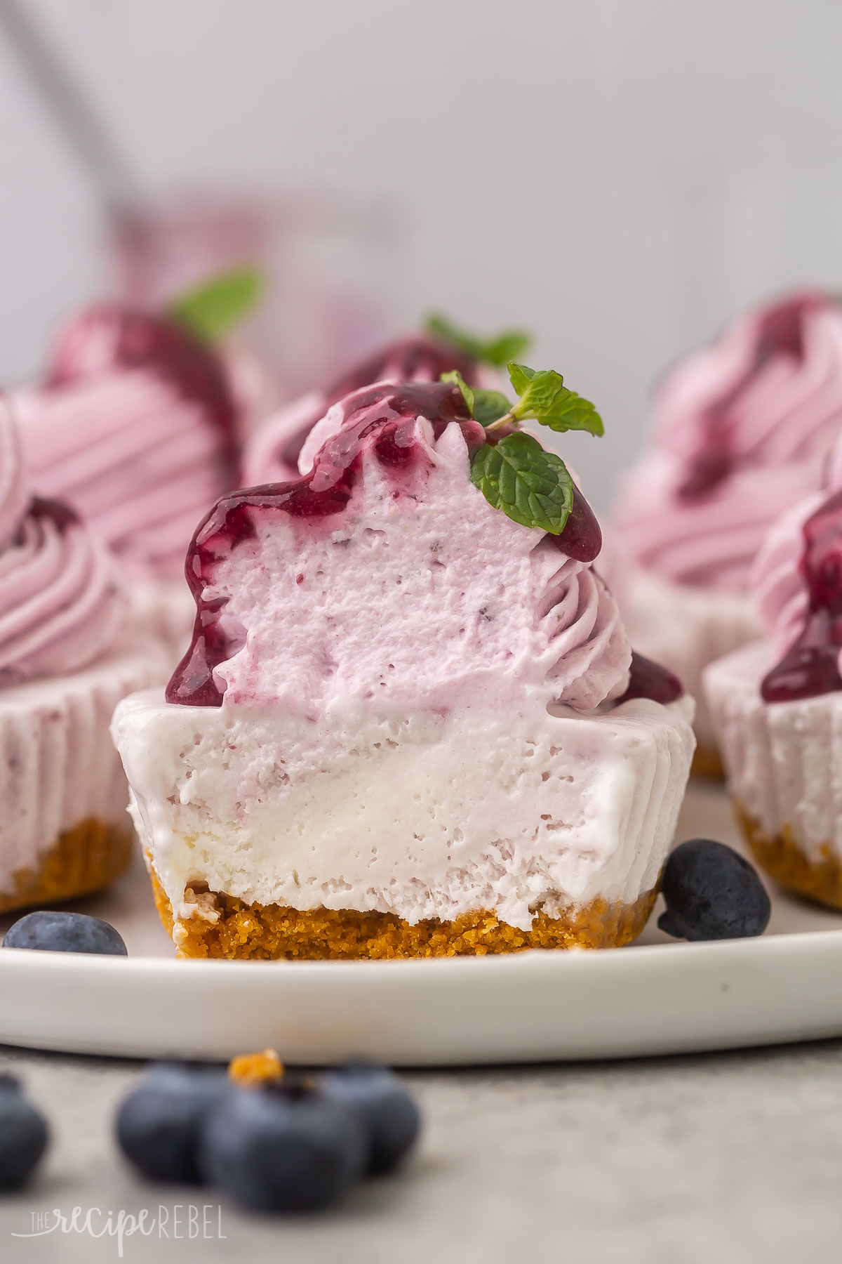 blueberry cheesecake ice cream cupcake cut open.