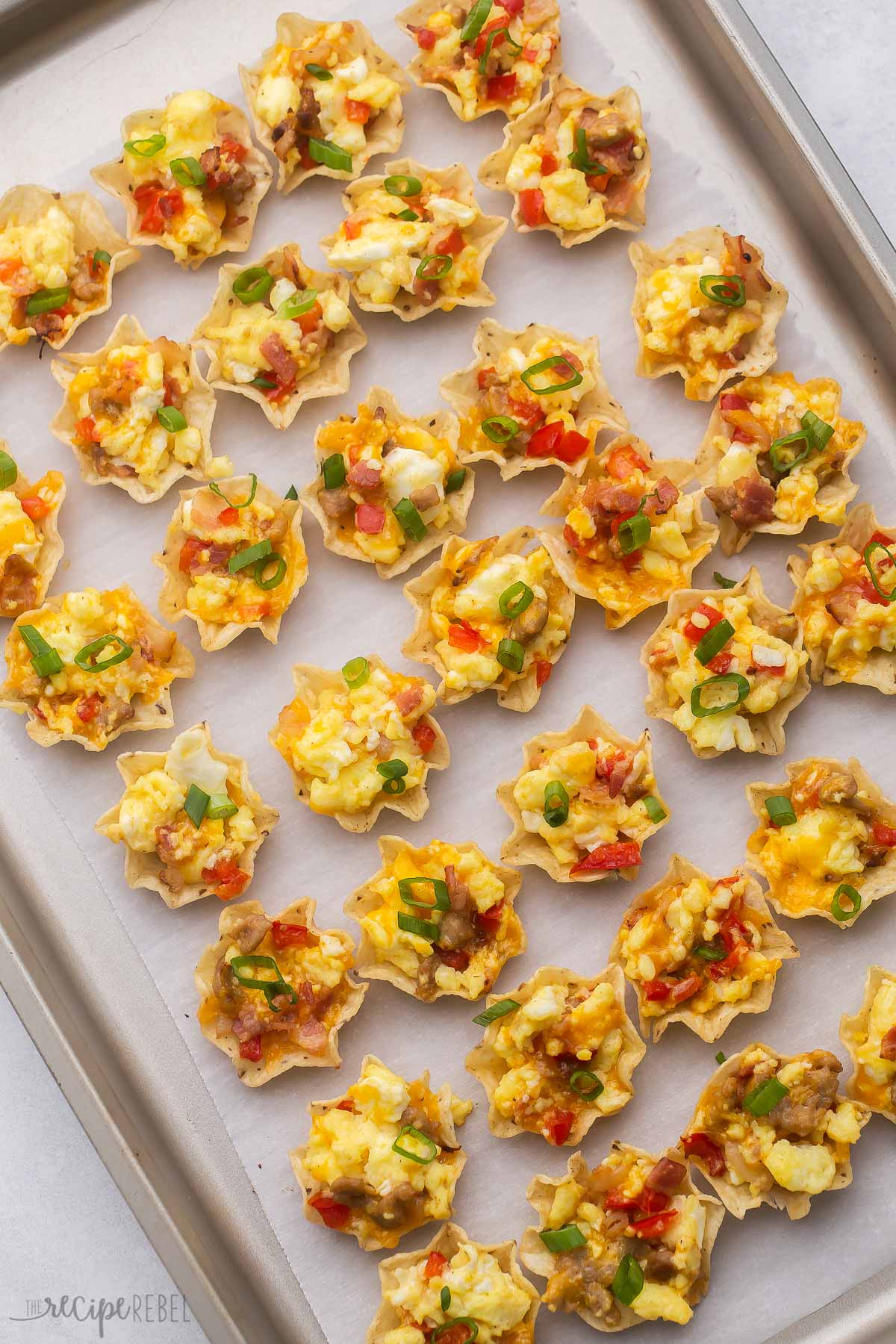 Top view of tray filled with breakfast taco bites. 