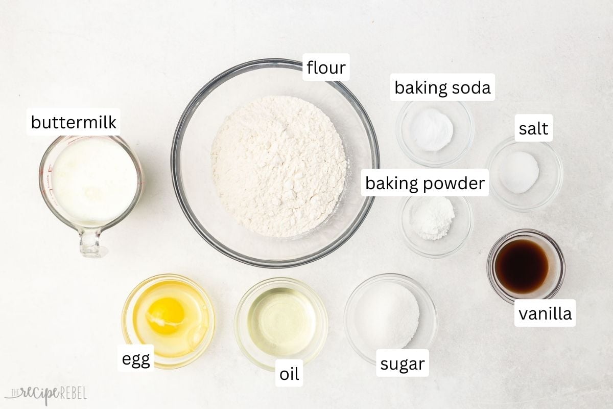 overhead view of buttermilk pancake ingredients in glass bowls.