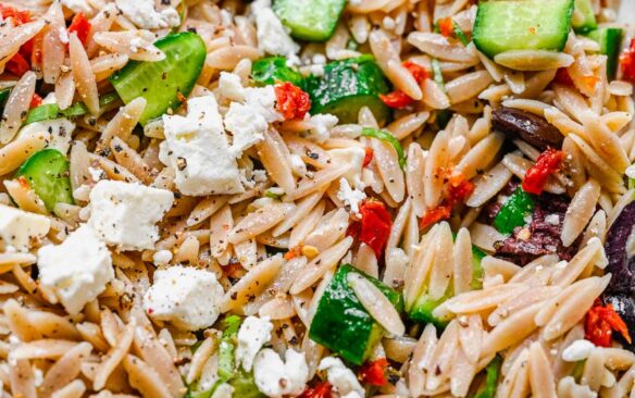 Top view close up of Greek Pasta Salad in a pasta bowl.