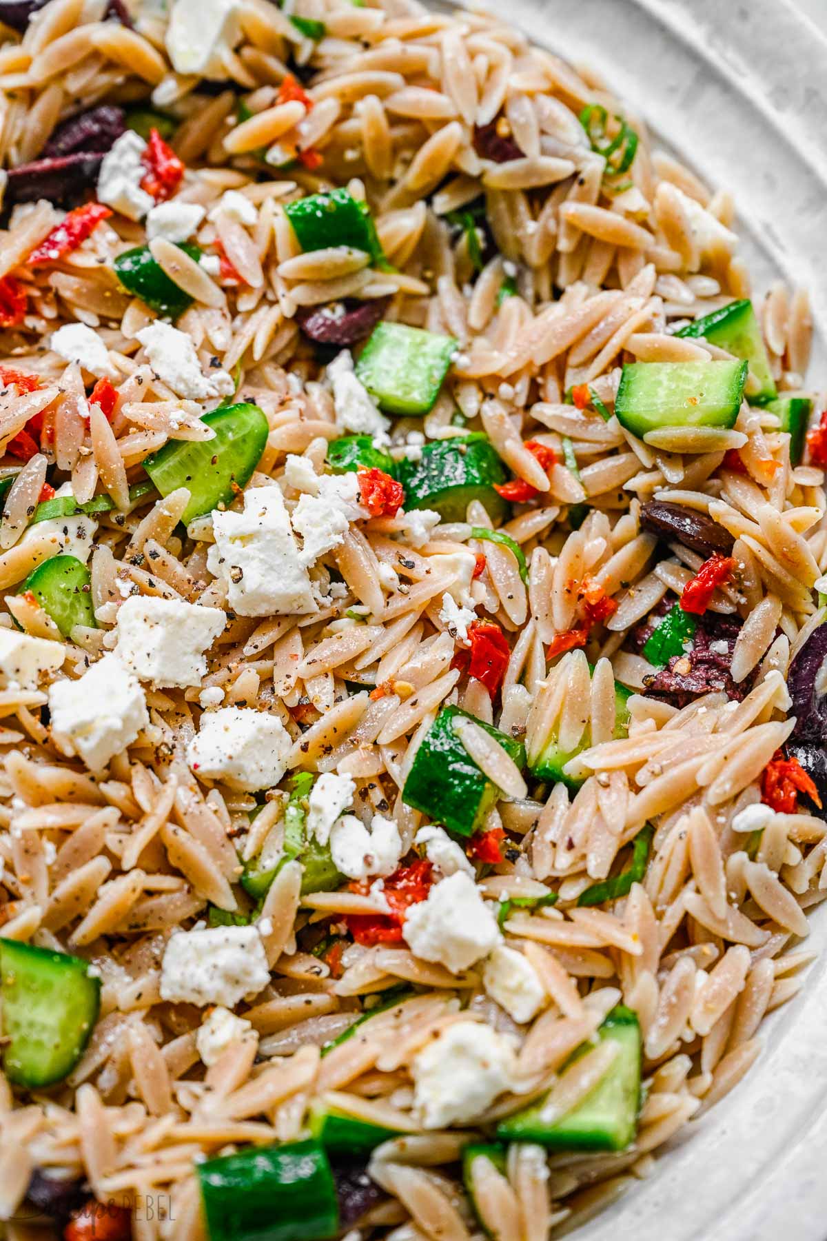 Top view close up of Greek Pasta Salad in a pasta bowl. 