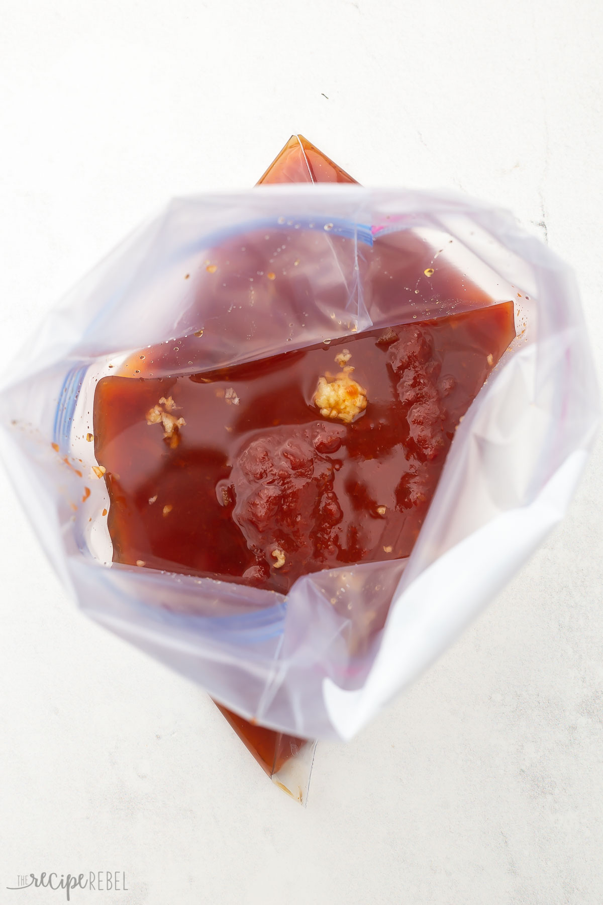 overhead view of ziplock bag with maple glaze in it.