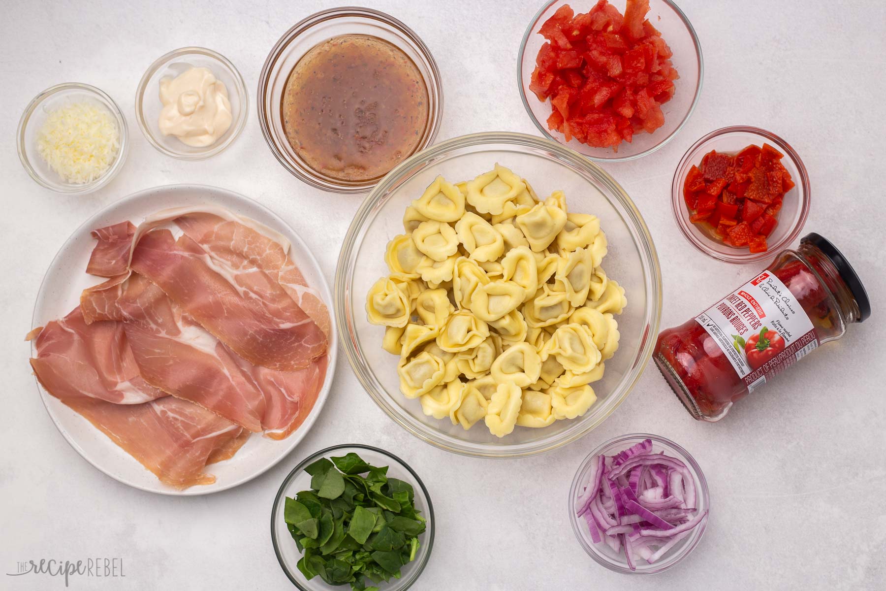 overhead view of ingredients for tortellini pasta salad.