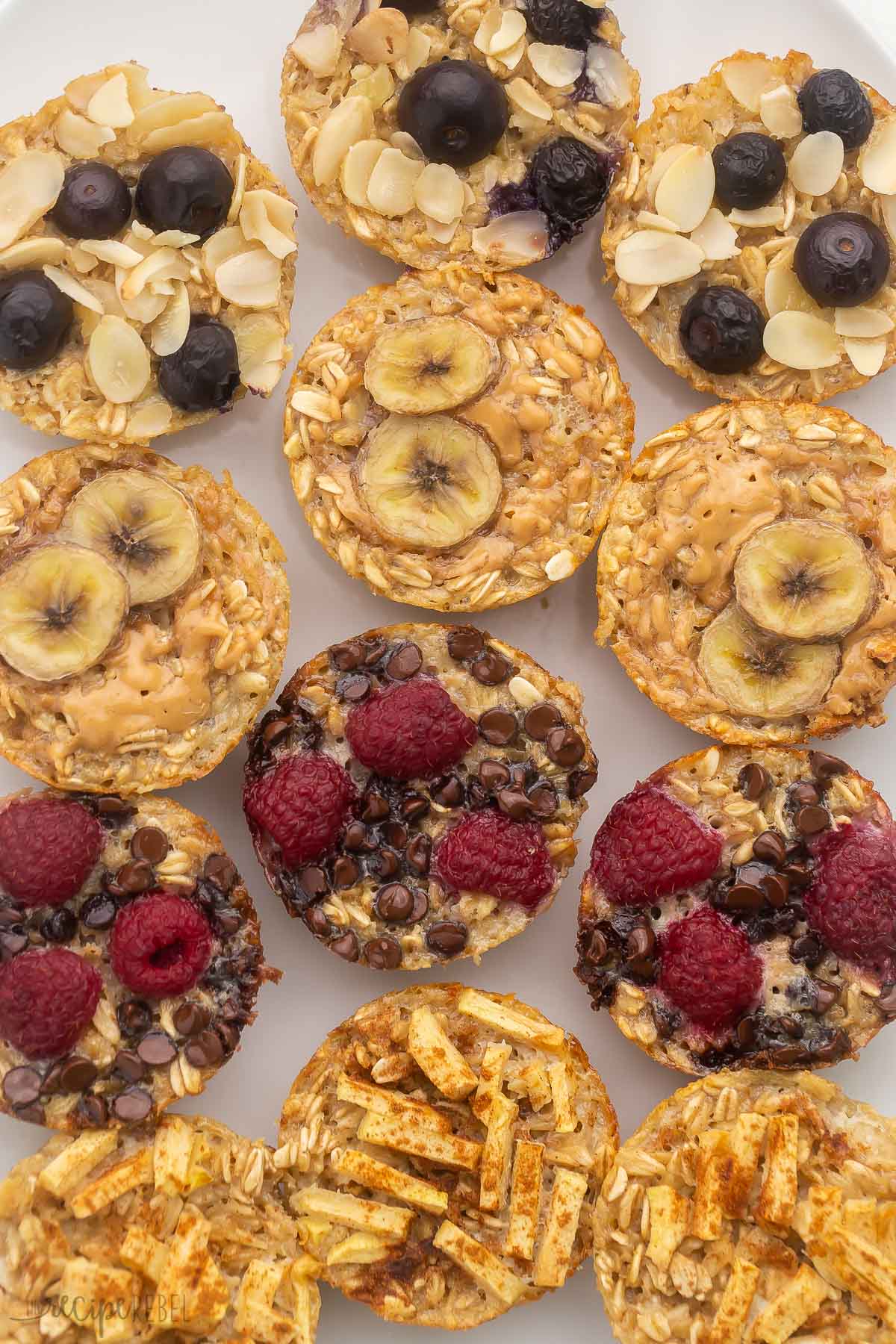 overhead shot of baked oatmeal cups on white surface.