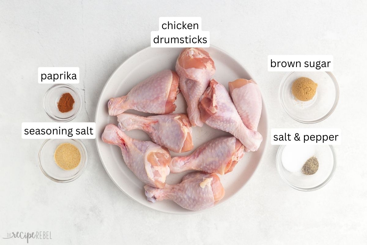 baked chicken drumstick ingredients on a white surface.