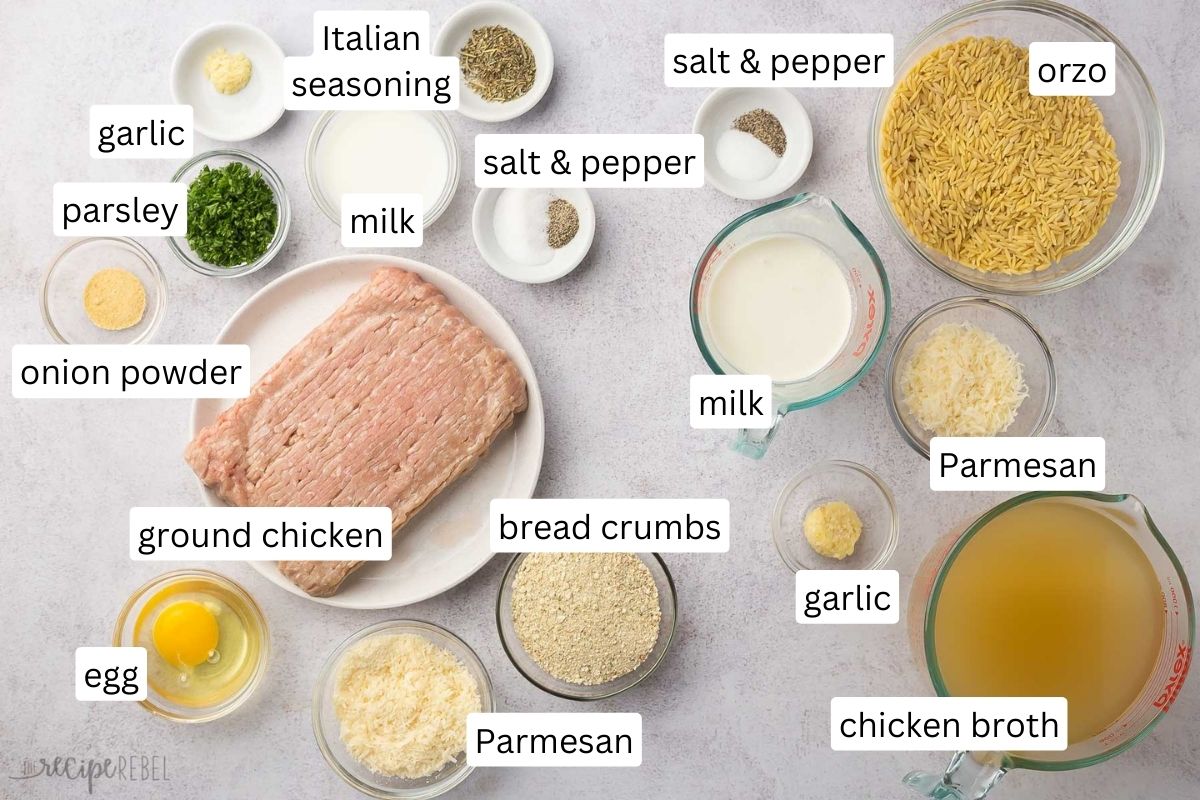ingredients for chicken meatballs with orzo on grey surface.