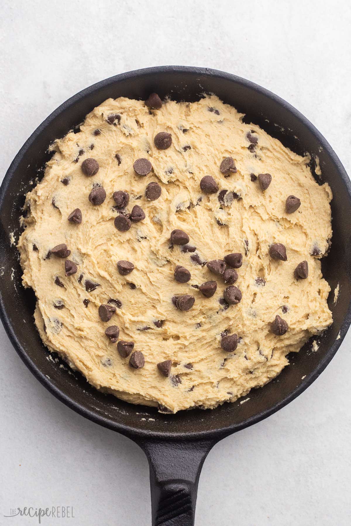 skillet cookie dough in black cast iron skillet.