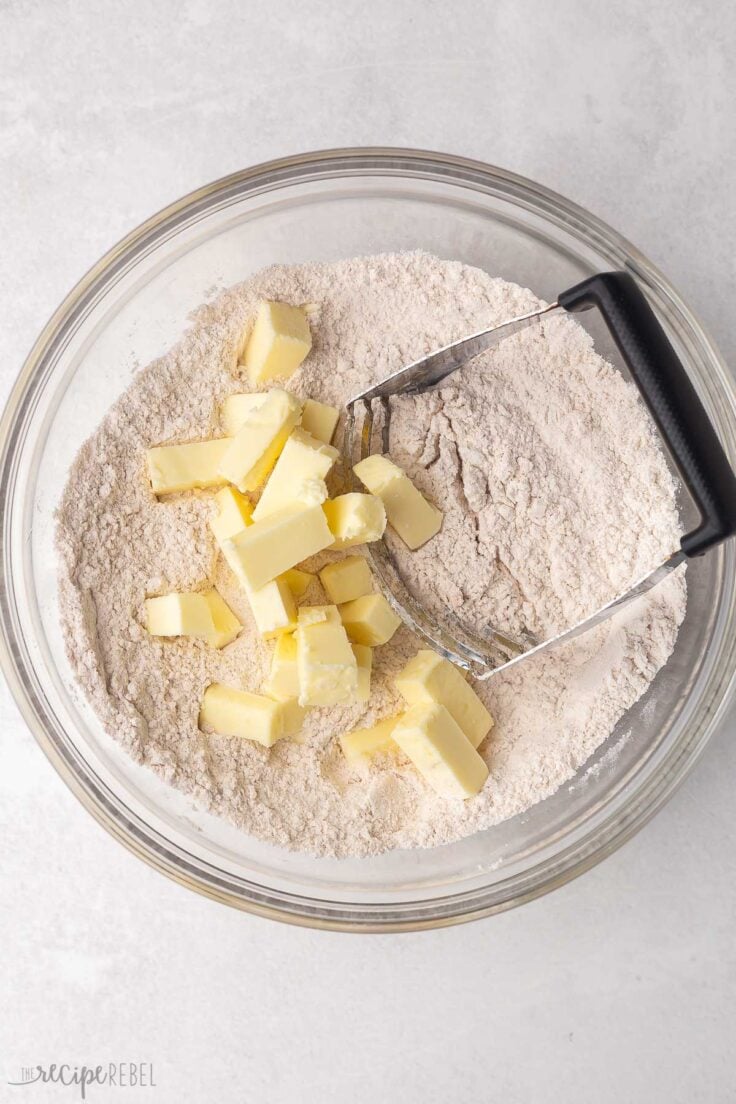 cutting in butter to scone dough.