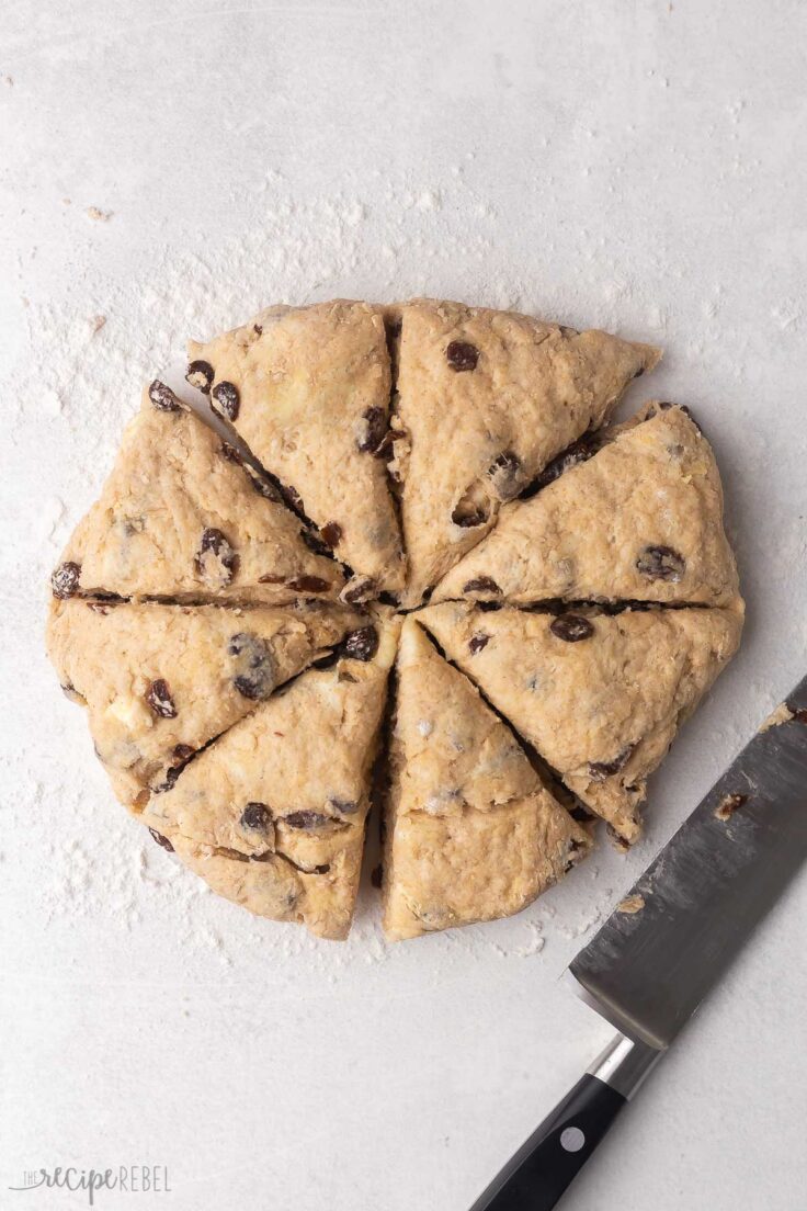 scone dough formed into disc and cut into triangles.