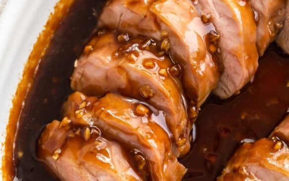 square image of honey garlic pork tenderloin recipe sliced.