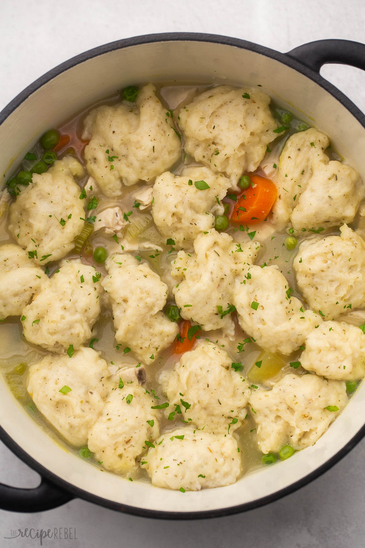 overhead view of a full pot of soup dumplings.