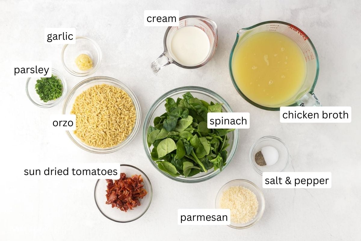 ingredients for sun dried tomato spinach orzo in glass bowls.