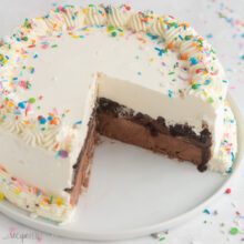 whole dairy queen ice cream cake with piece cut out.