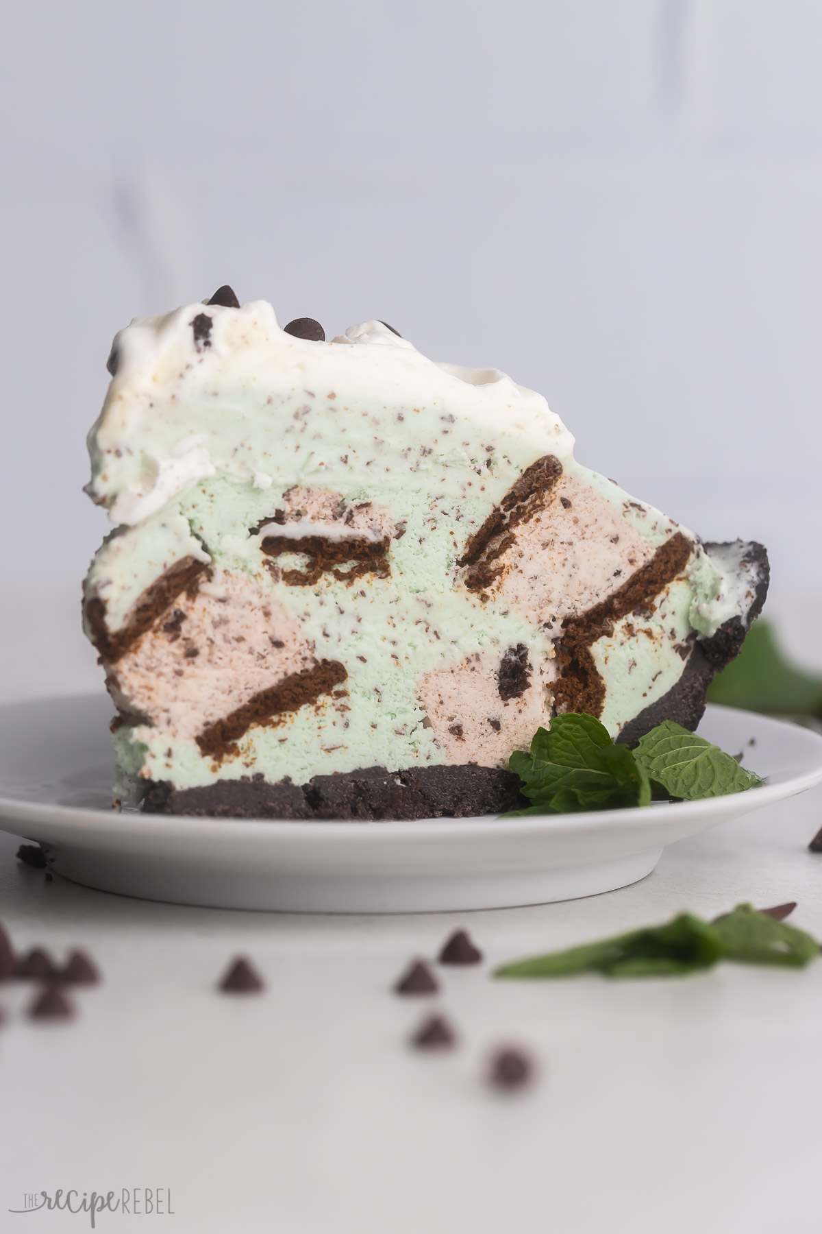 slice of grasshopper ice cream pie on a white plate.