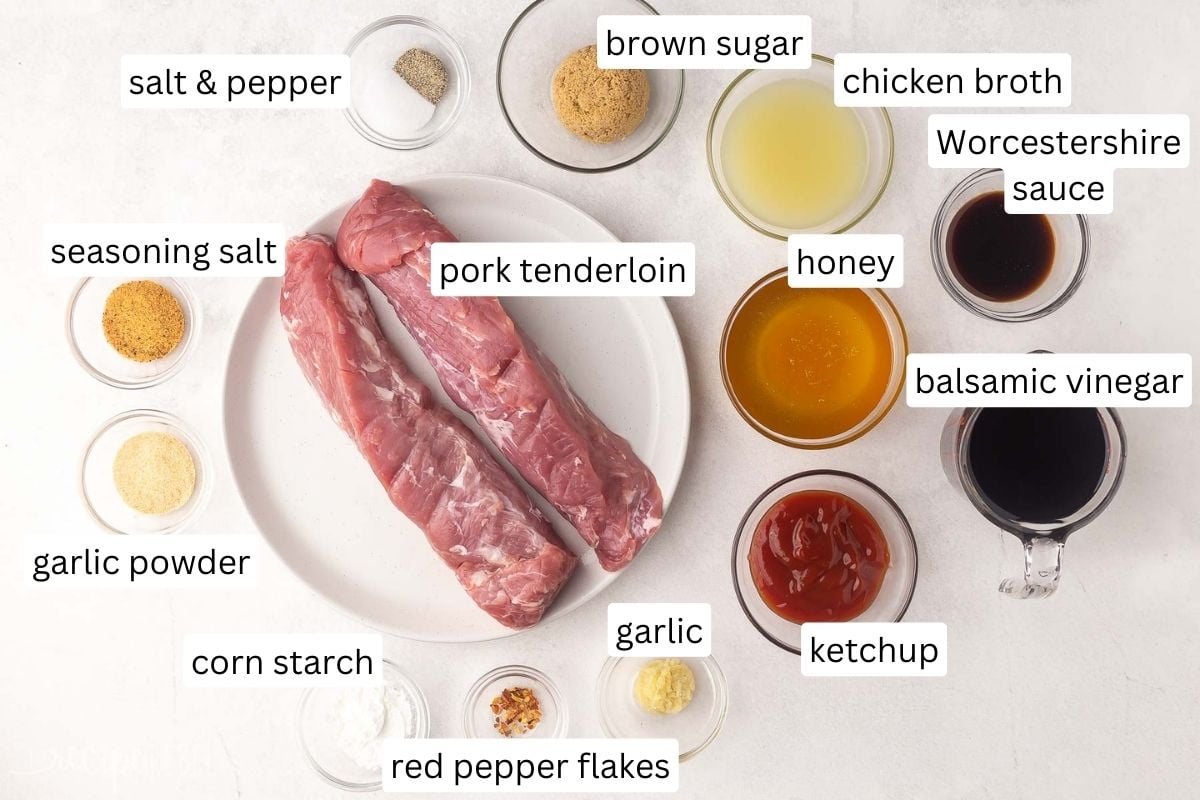 ingredients for honey balsamic pork tenderloin on grey surface.