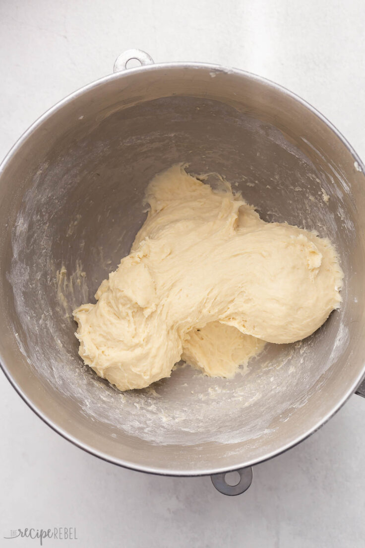 mixed dough ingredients in steel mixing bowl.