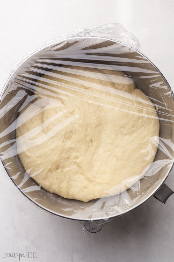 monkey bread dough rising in covered bowl.