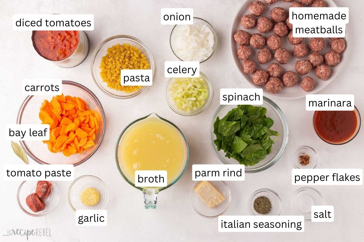 ingredients for Italian meatball soup in glass bowls.