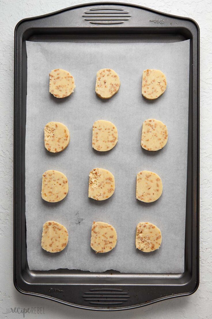 unbaked toffee shortbread on a sheet pan ready to be baked.