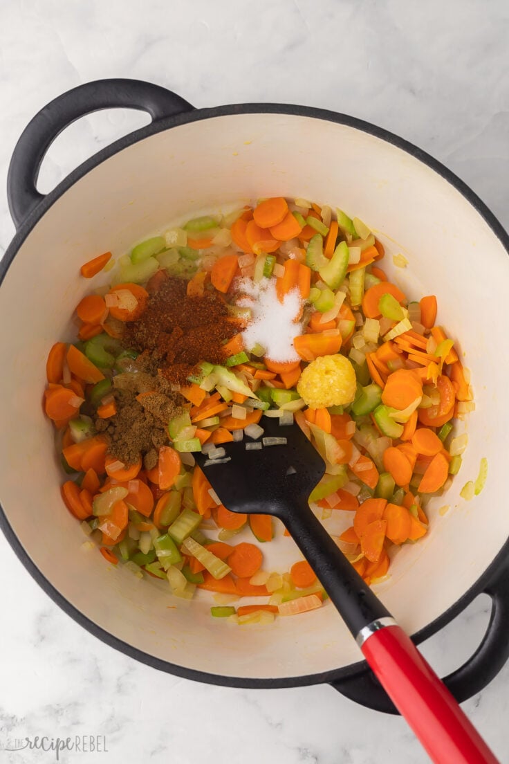 large pot filled with sauteed vegetables and spices.