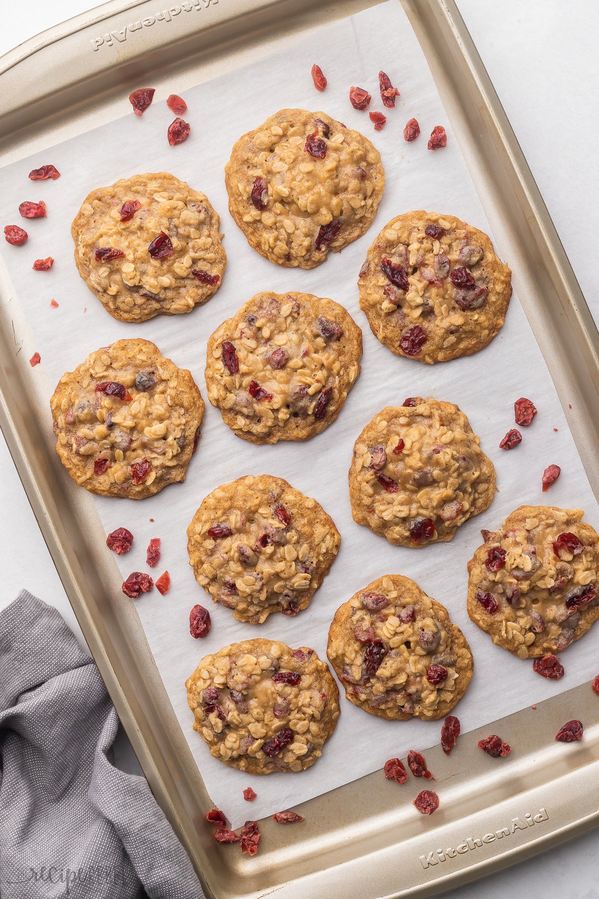 Top view of Oatmeal Cranberry Cookies on a baking tray.