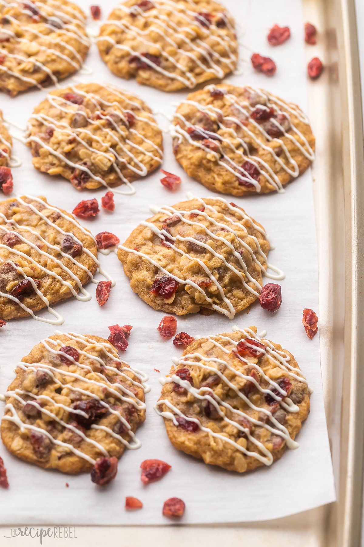 Top view of Oatmeal Cranberry Cookies on a baking tray.