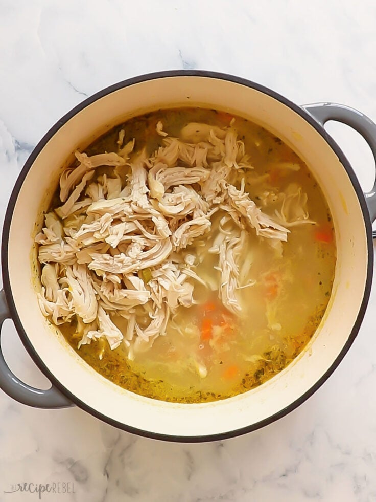 Shredded chicken added back into pot.