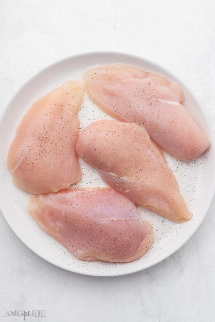 chicken breasts on a white plate.