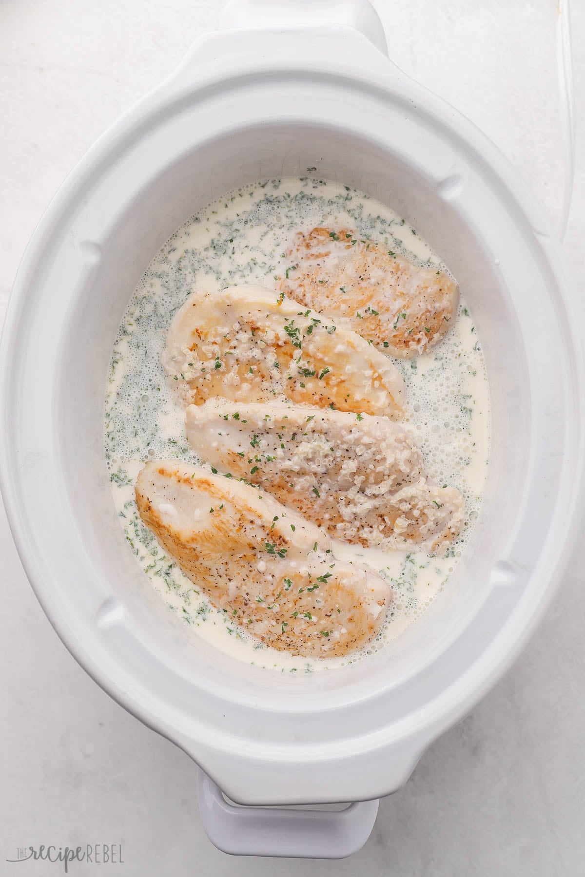 Crockpot Creamy Garlic Chicken [VIDEO] - The Recipe Rebel