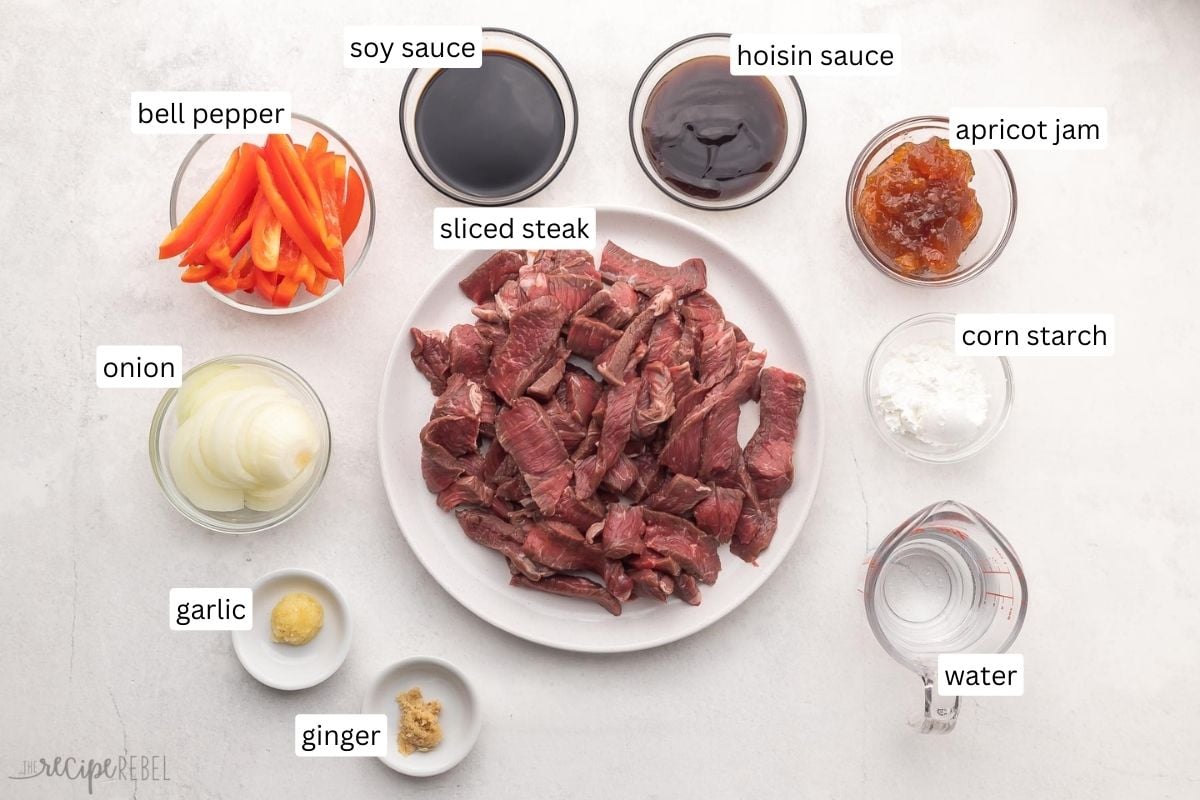 ingredients for slow cooker mongolian beef in glass bowls.