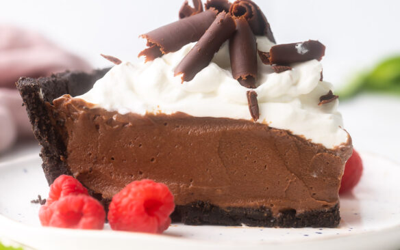 square image of slice of french silk pie on a white plate.