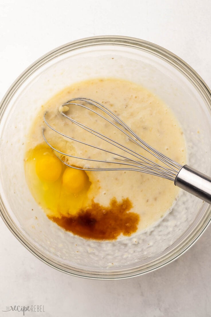 mixed wet ingredients in glass mixing bowl with whisk.