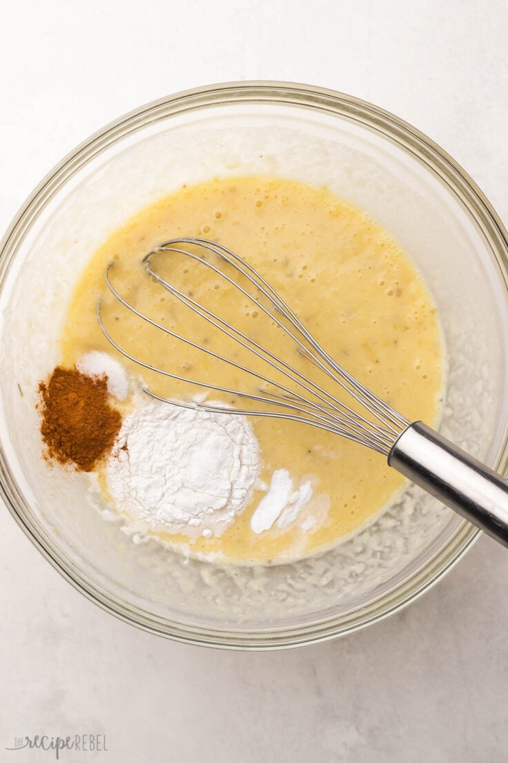 baking soda, cinnamon, and salt added to ingredients in bowl.