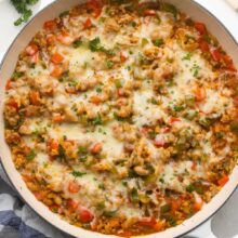 close up of stuffed pepper casserole in white dish.