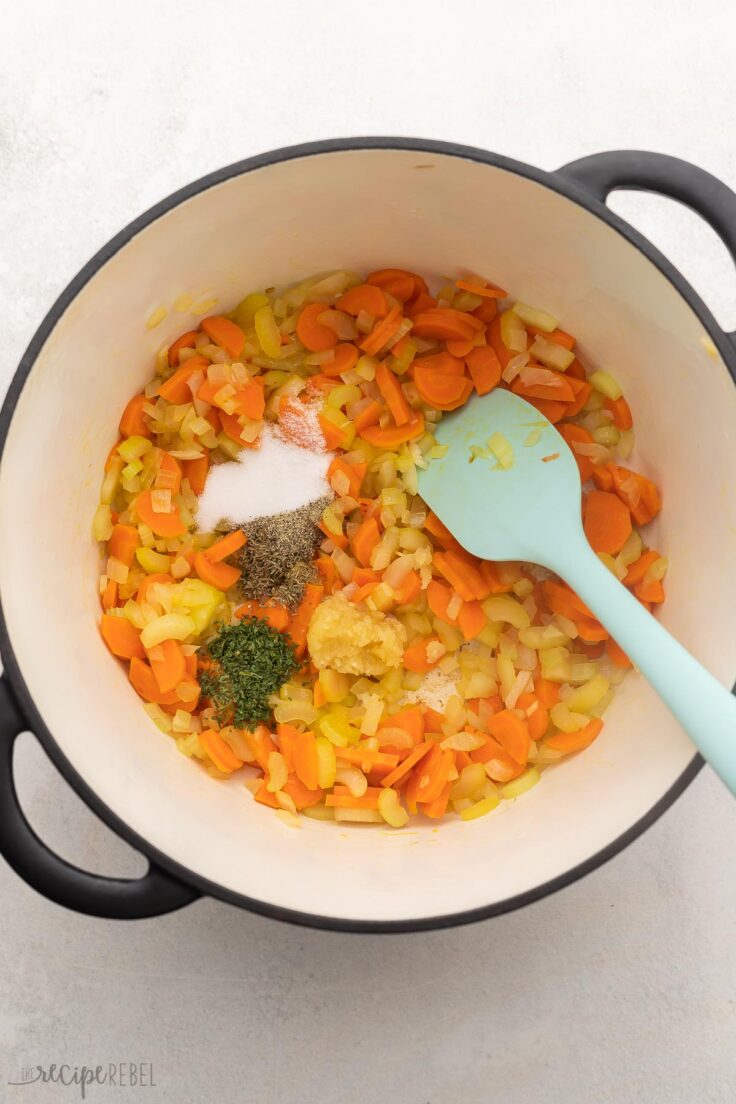 large pot filled with sauteed vegetables and spices.