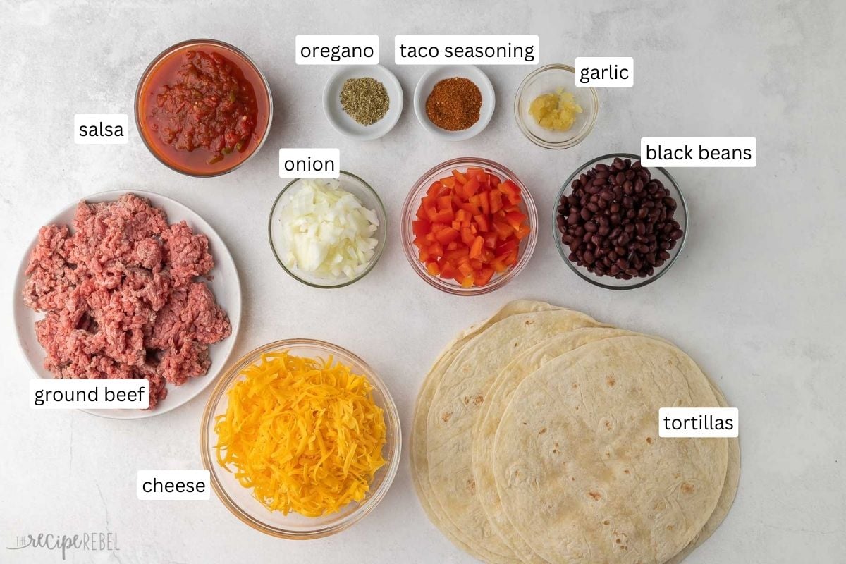 ingredients needed for taco casserole on grey surface.