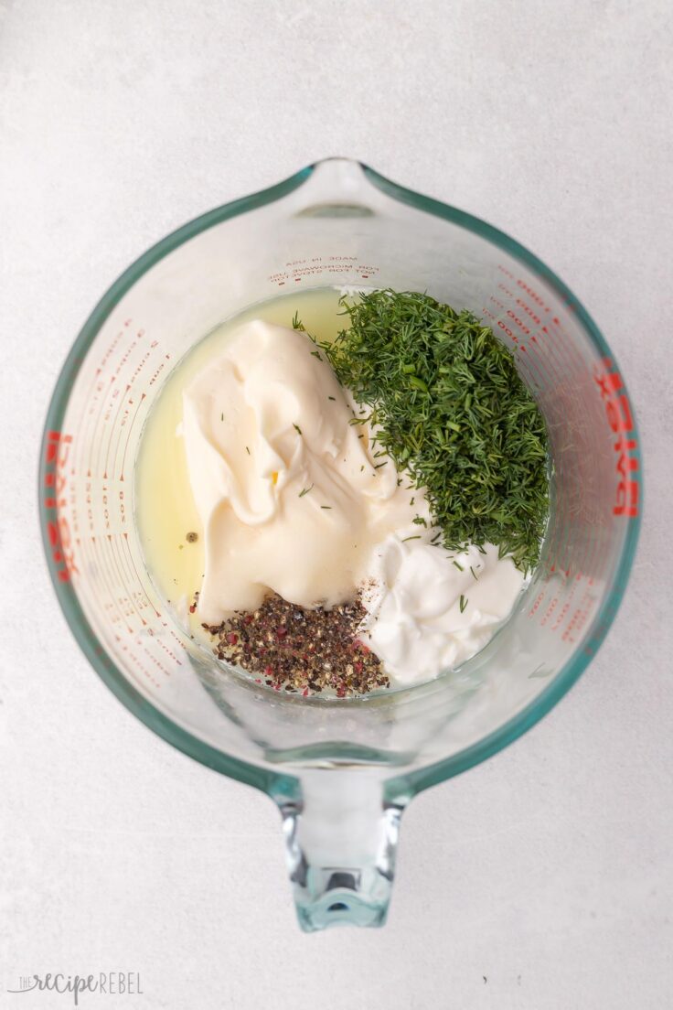 unstirred ingredients in a glass measuring cup.